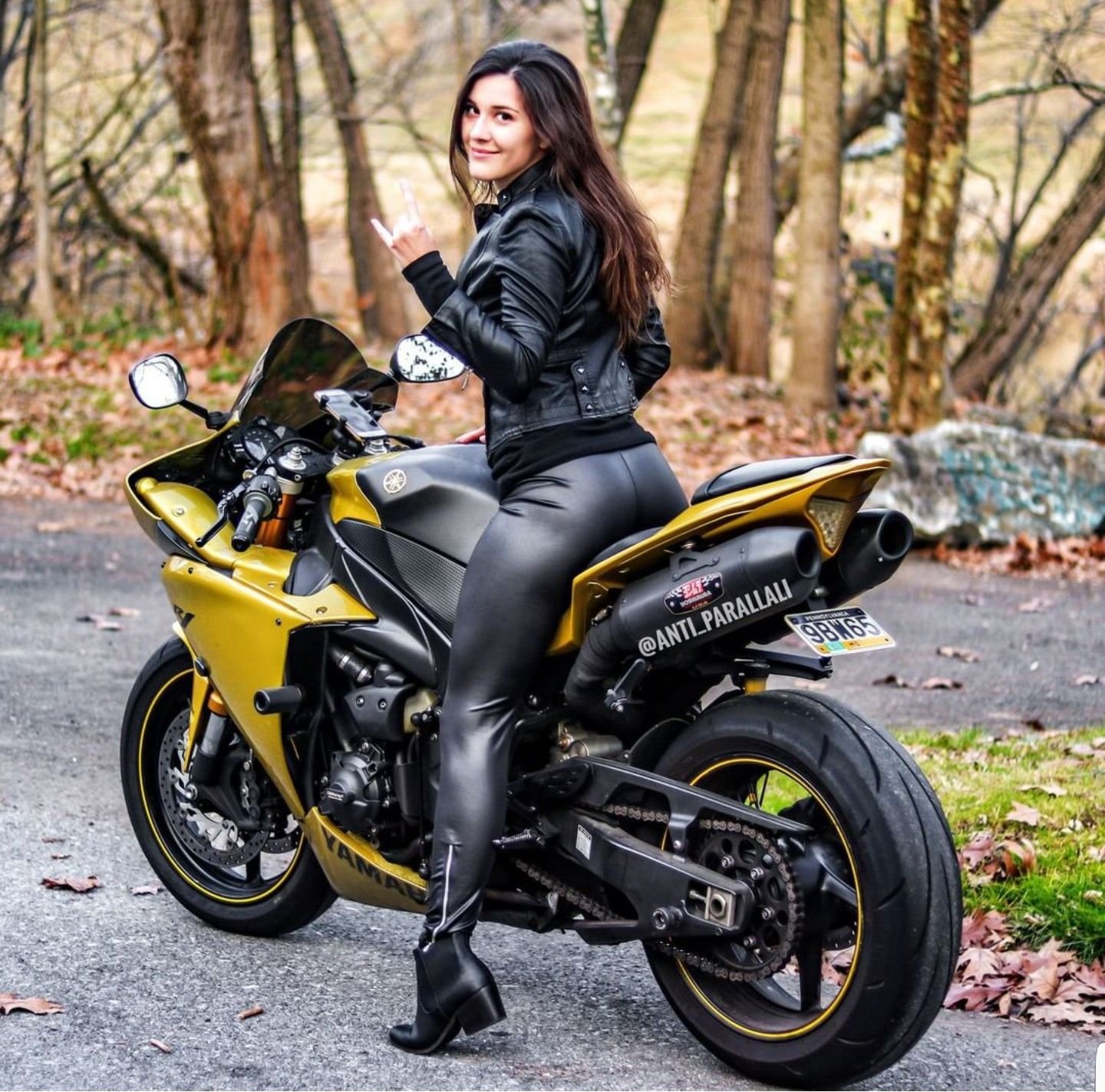 Sexy girl Brunettes on a motorcycle in Sana
